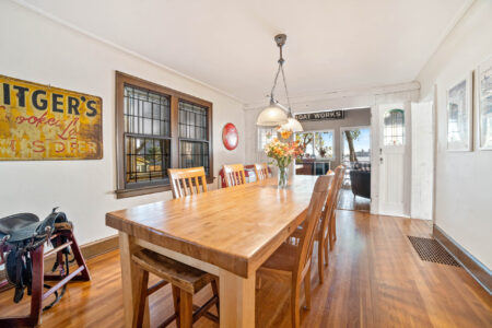 Dining area with bay views at Bayview Cottage